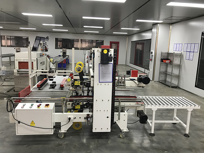 Auto Box Sealing Machines